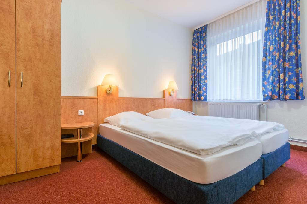 Cvjm Hotel Am Wollmarkt Брауншвейг Номер фото